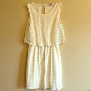 Casual white dress with dotted patterns